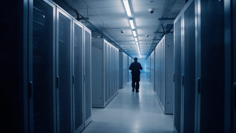Security officer in a data center server aisle